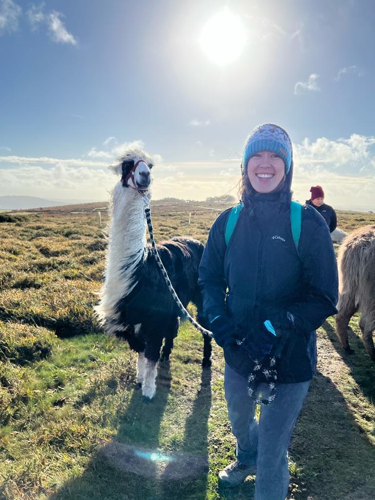 Photo of Sam and a llama